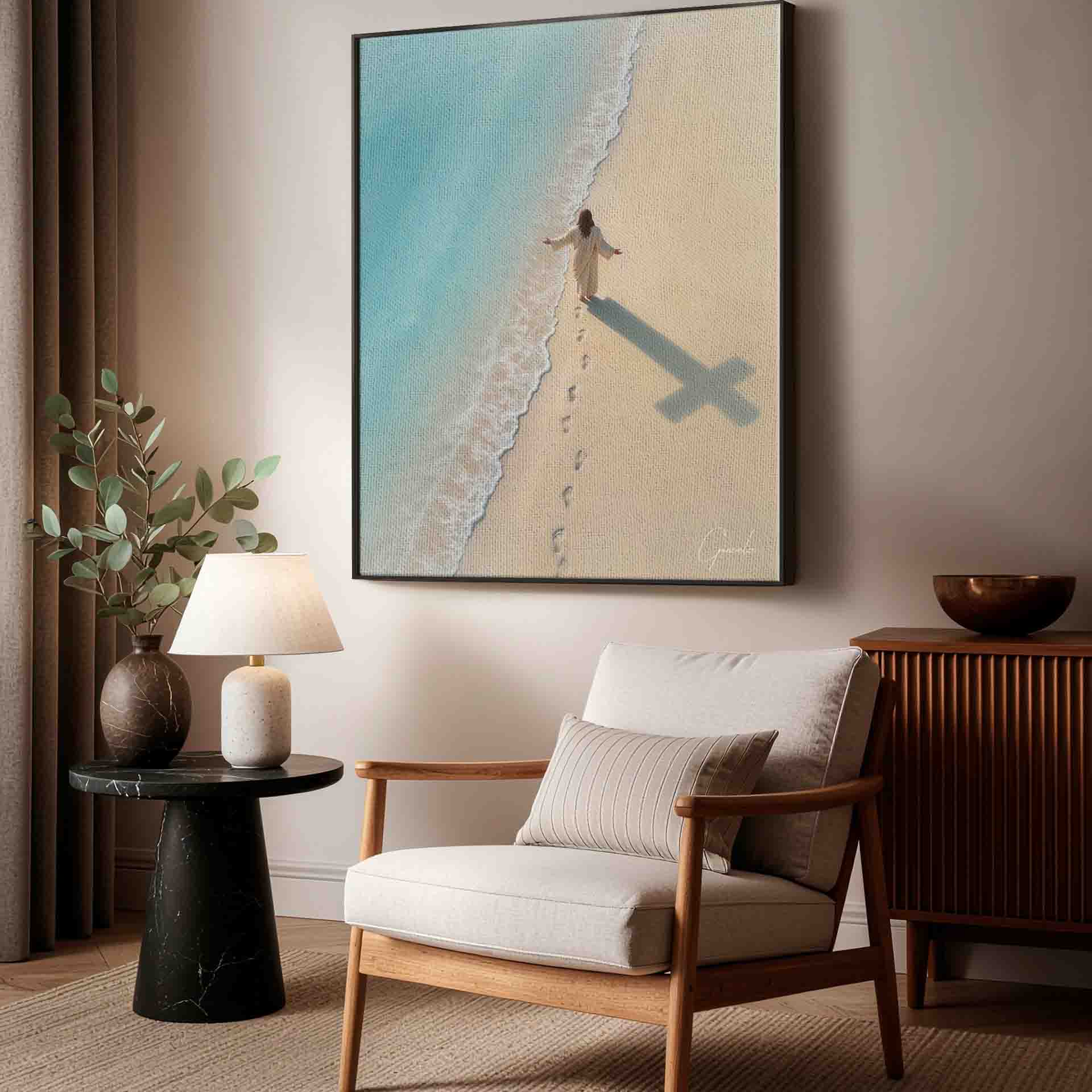Footprints trail behind the figure toward a turquoise ocean