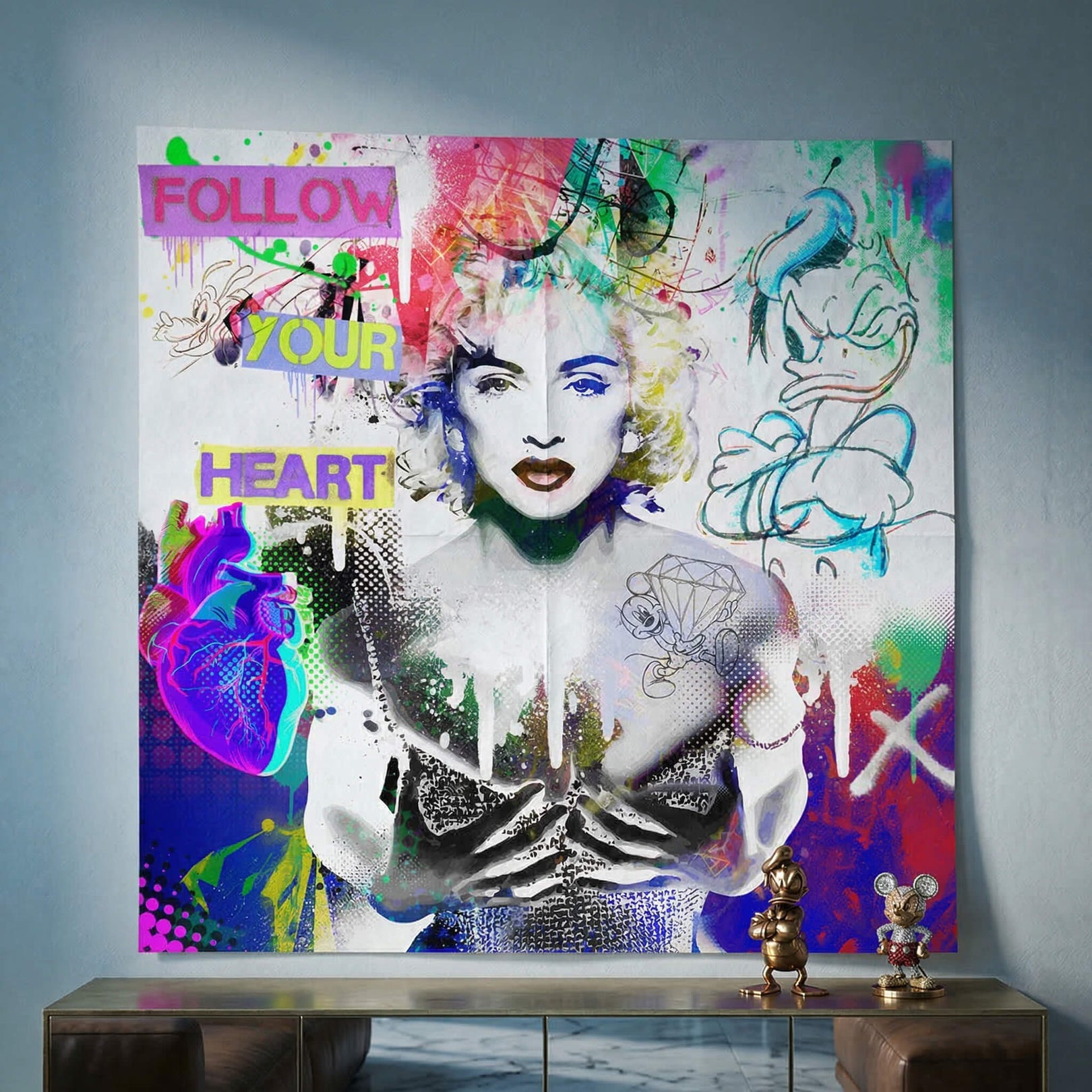 Stylized monochrome Madonna portrait with neon accents against a graffiti-filled background.