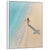 Portrait of Christ walking along a sandy beach with a cross-shaped shadow on the sand