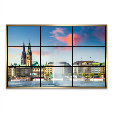Hamburg harbor and skyline at dusk with colorful clouds