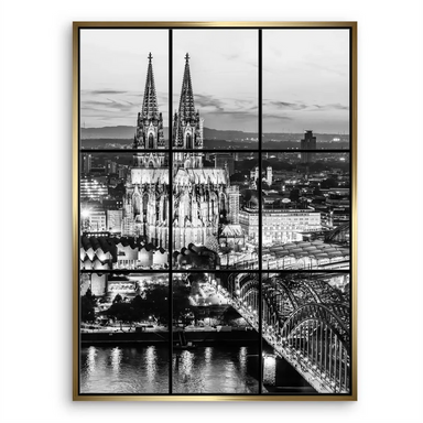 Evening panorama focusing on church and bridge against a dark sky