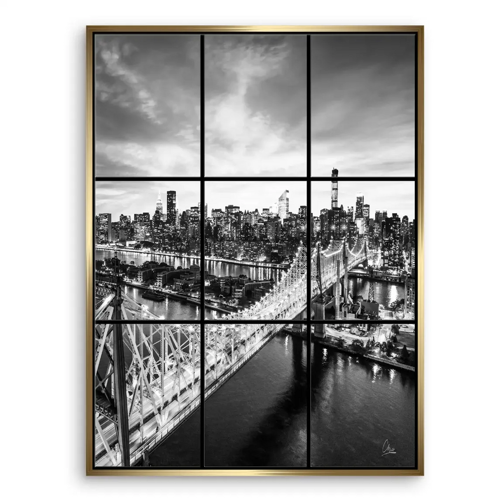 Dramatic grayscale view of New York City at night, centered on the glowing bridge across seven panels.