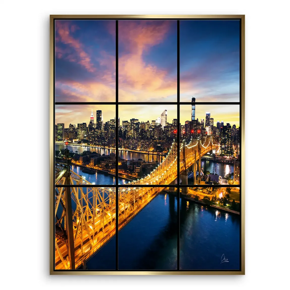 The Queensboro Bridge spanning the river with reflections glimmering on deep blue water.