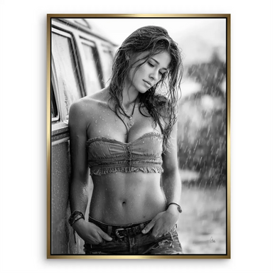 Canvas wall art featuring a woman in a rainy urban scene