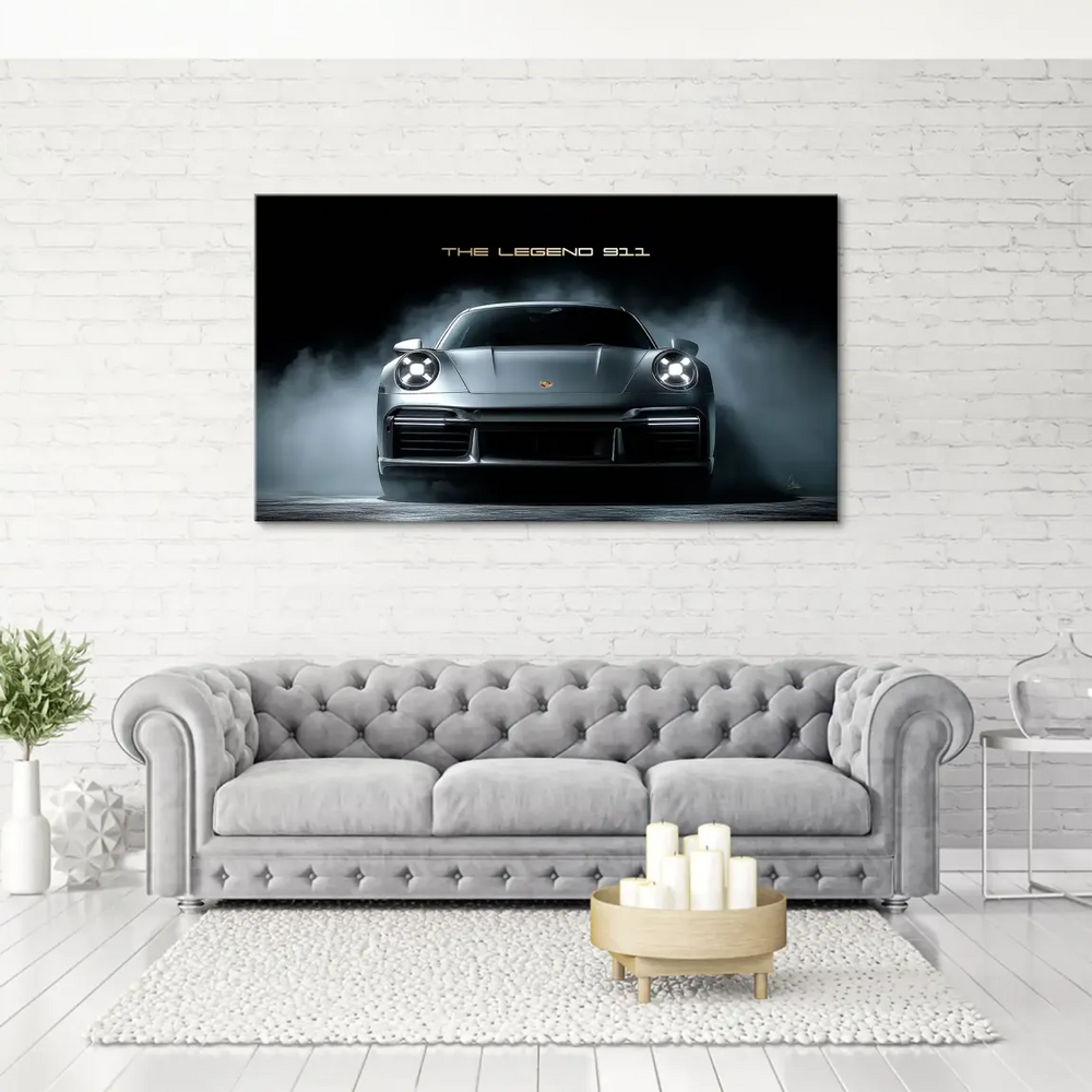Close-up of the Porsche 911's front end in dramatic studio lighting.