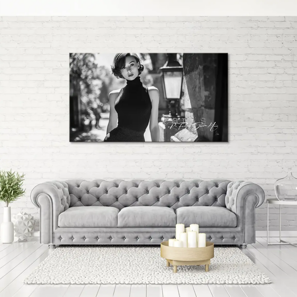 Monochrome fashion portrait evoking Audrey Hepburn in a timeless pose.