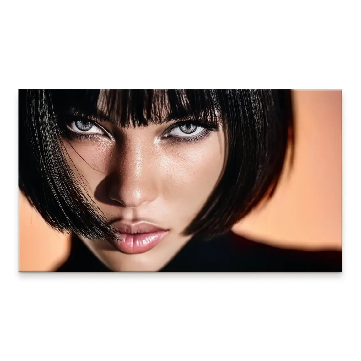 Close-up portrait of a woman with a dark bob and bangs, direct gaze, peachy-orange background, dramatic lighting