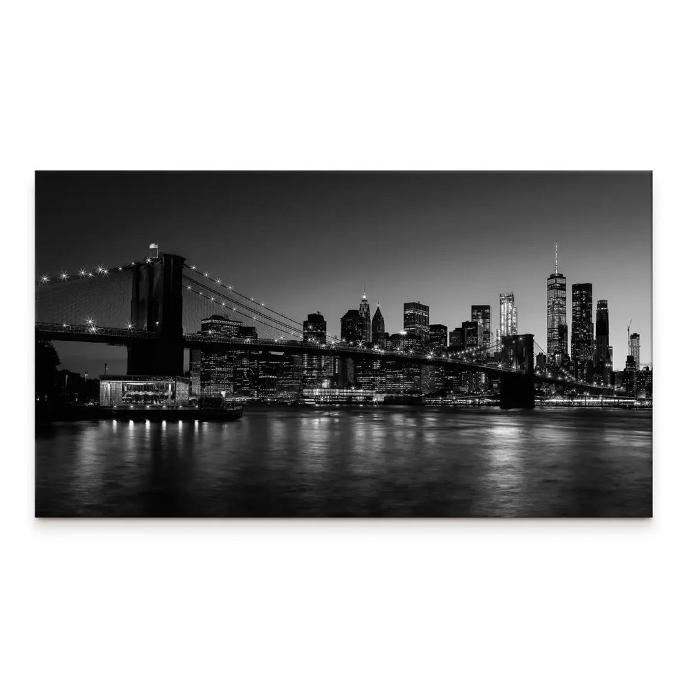 Black-and-white canvas print of Manhattan skyline with Brooklyn Bridge at dusk
