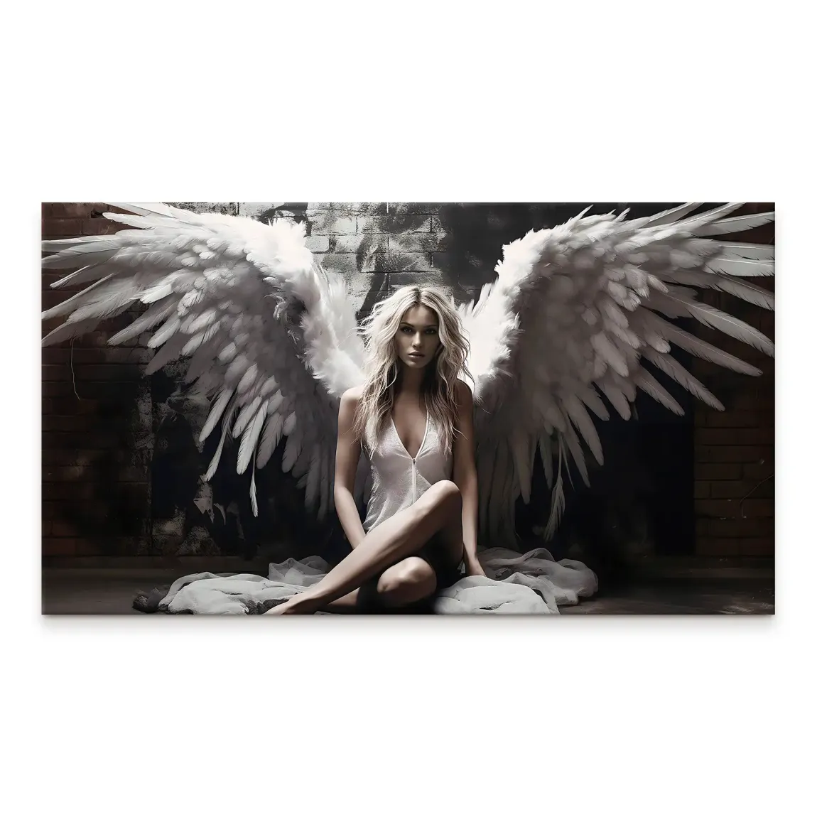 Portrait of a blonde woman with large white angel wings against a dark brick wall