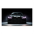 Sleek black BMW M4 sports car head-on with purple-pink LED headlights in a moody backdrop