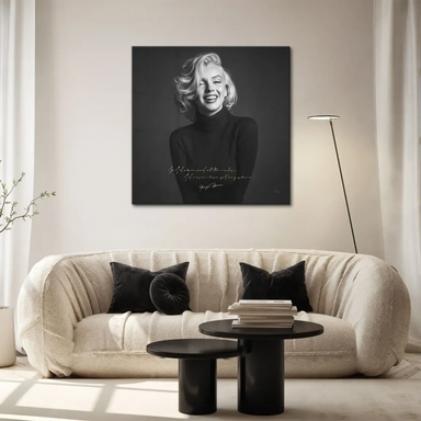 Full portrait of Marilyn Monroe in black-and-white with gold signature quote on canvas.