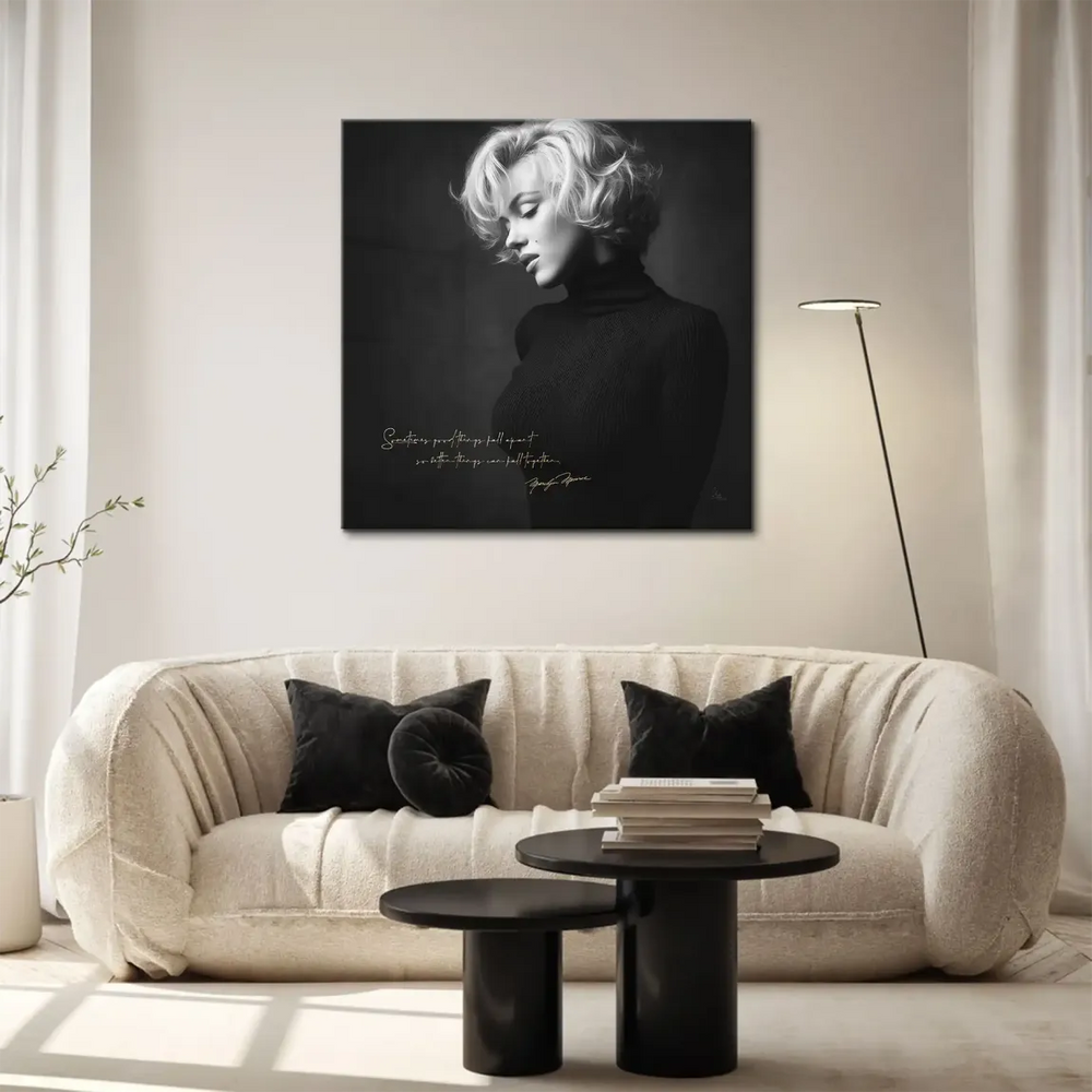 Black-and-white Marilyn Monroe close-up with reflective gaze and vintage styling