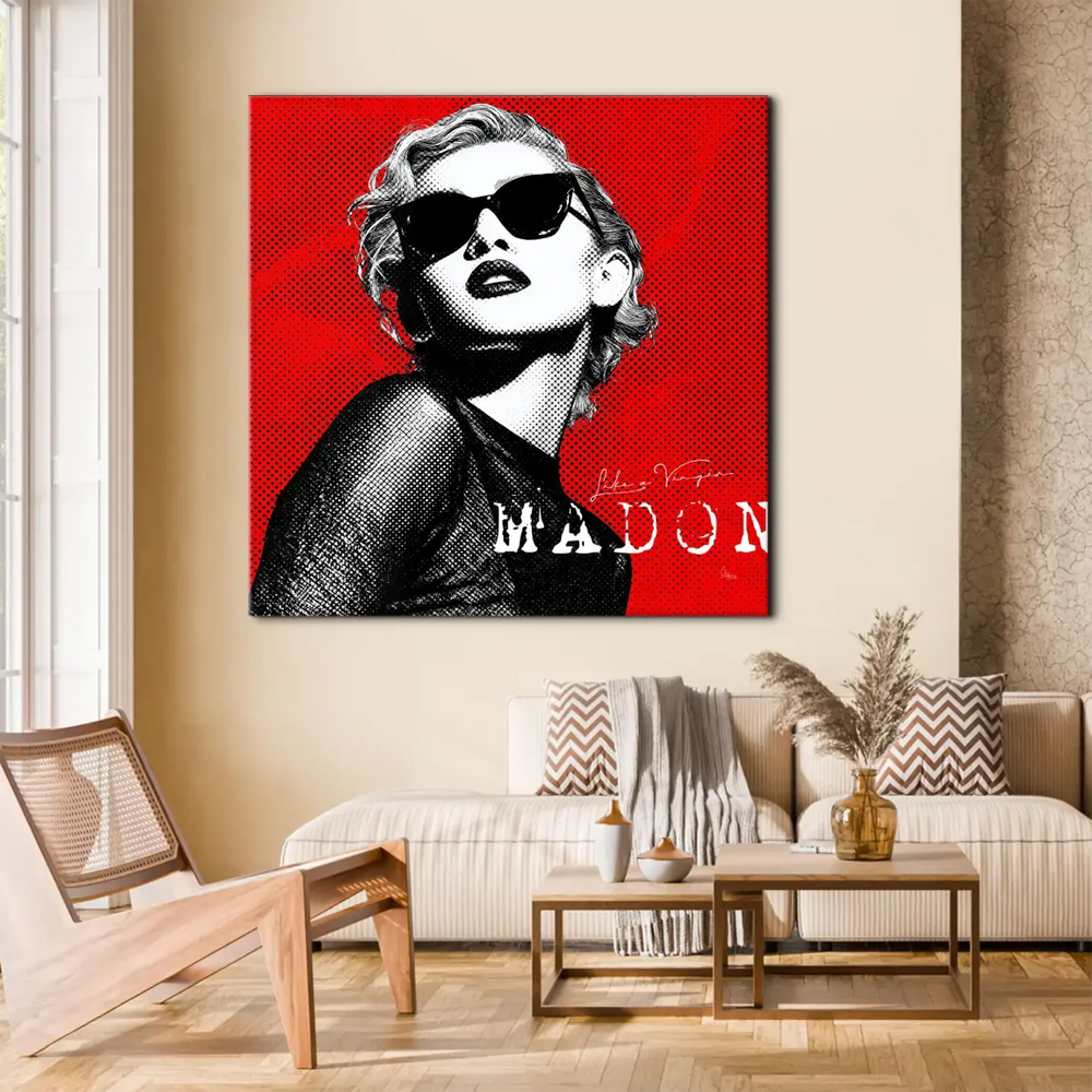 Madonna wearing sunglasses in a pop-art style portrait