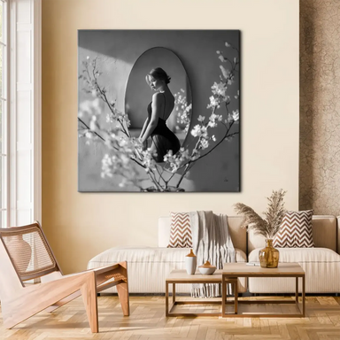 Monochrome fine art photograph featuring a backless-dress woman in a calm, introspective pose.