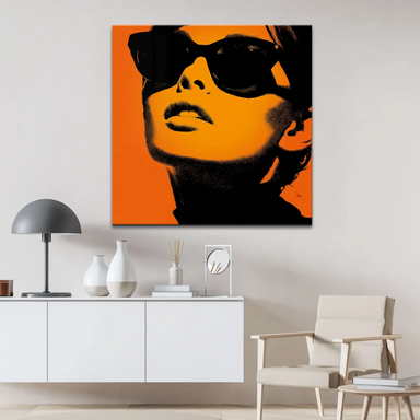 Square canvas wall art of a confident woman with an orange and black palette