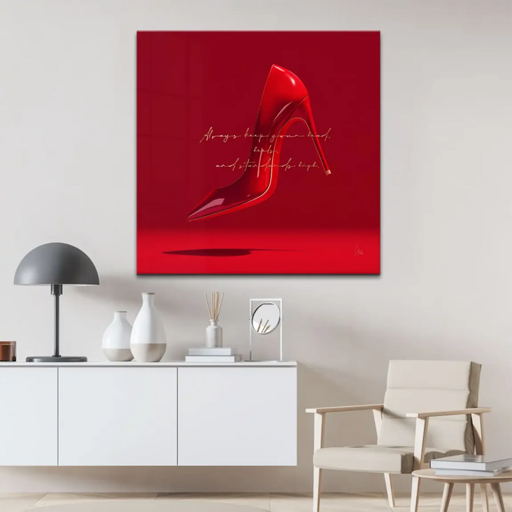 Close-up of a red stiletto highlighting its sleek shape and luxurious finish.