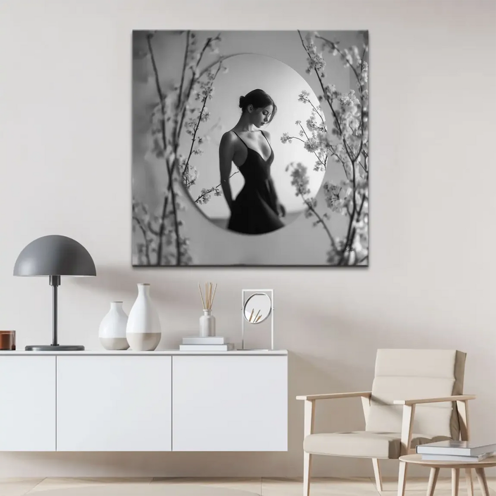 Soft-focused blossoms frame a poised female silhouette on a square canvas wall art.