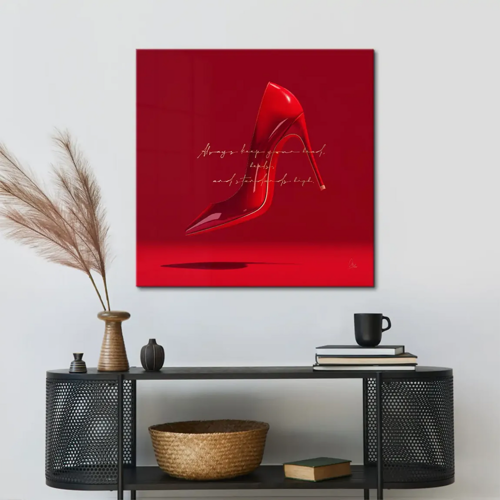 Minimalist fashion wall art featuring a single red heel against a bold red backdrop.