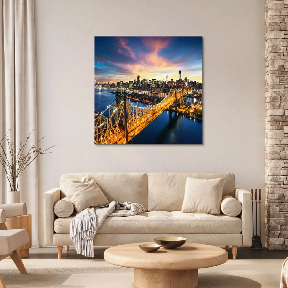 Ed Koch Queensboro Bridge spanning the East River against a vibrant cityscape.