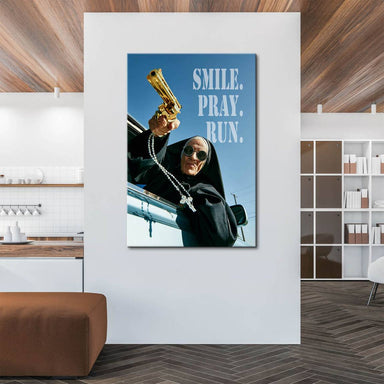 Stencil-like text 'SMILE. PRAY. RUN.' rises above the nun in a vivid blue and gold Pop Art street art style.