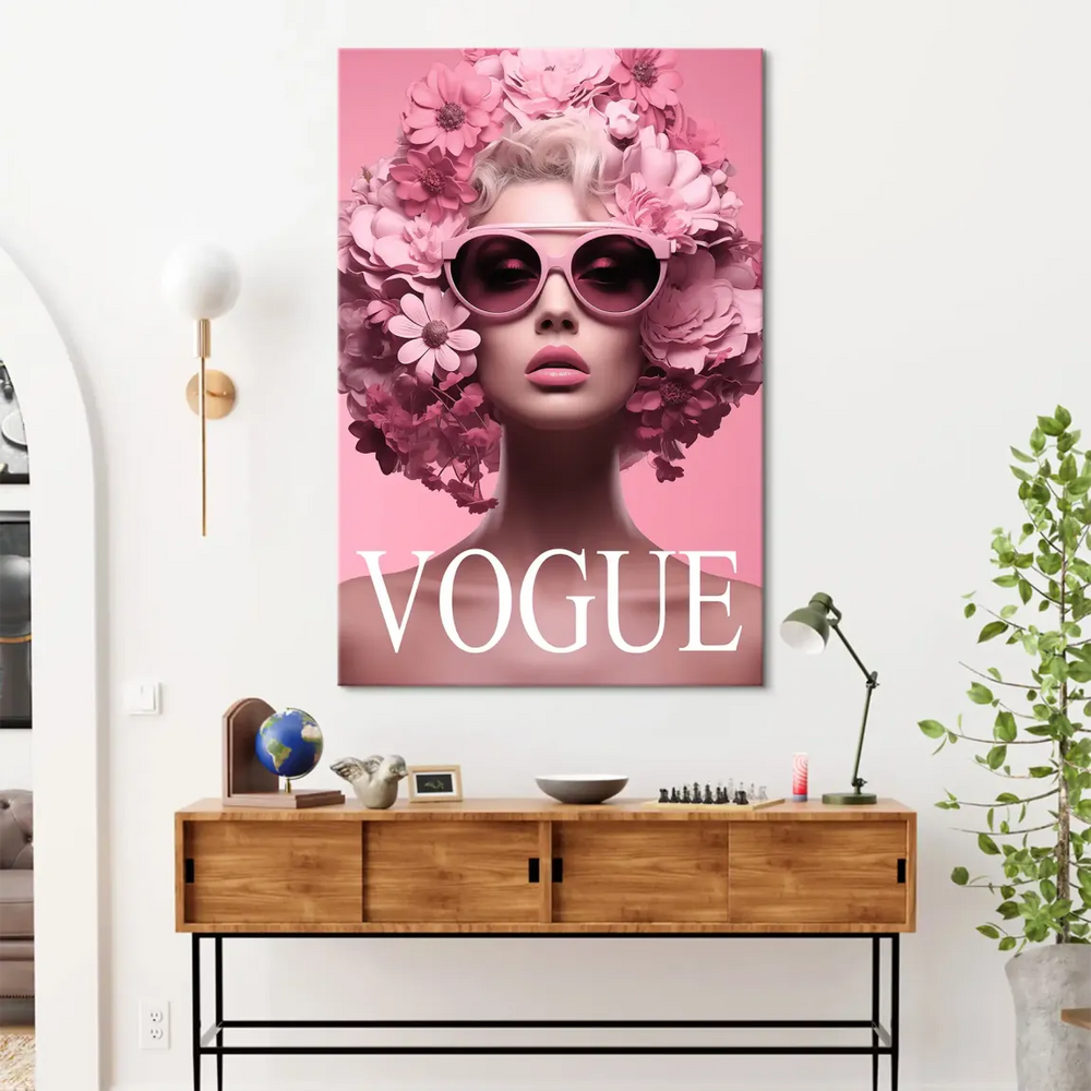 Portrait of a stylish woman wearing oversized pink sunglasses on pink floral art