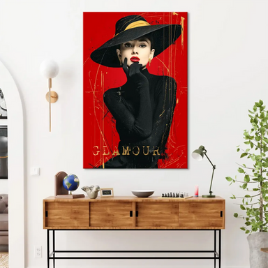 Vintage Hollywood-inspired wall art featuring Audrey Hepburn in a red backdrop