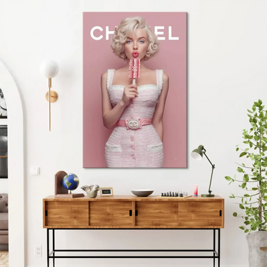 Close-up of the lips and chic makeup with CHANEL text visible on the popsicle.