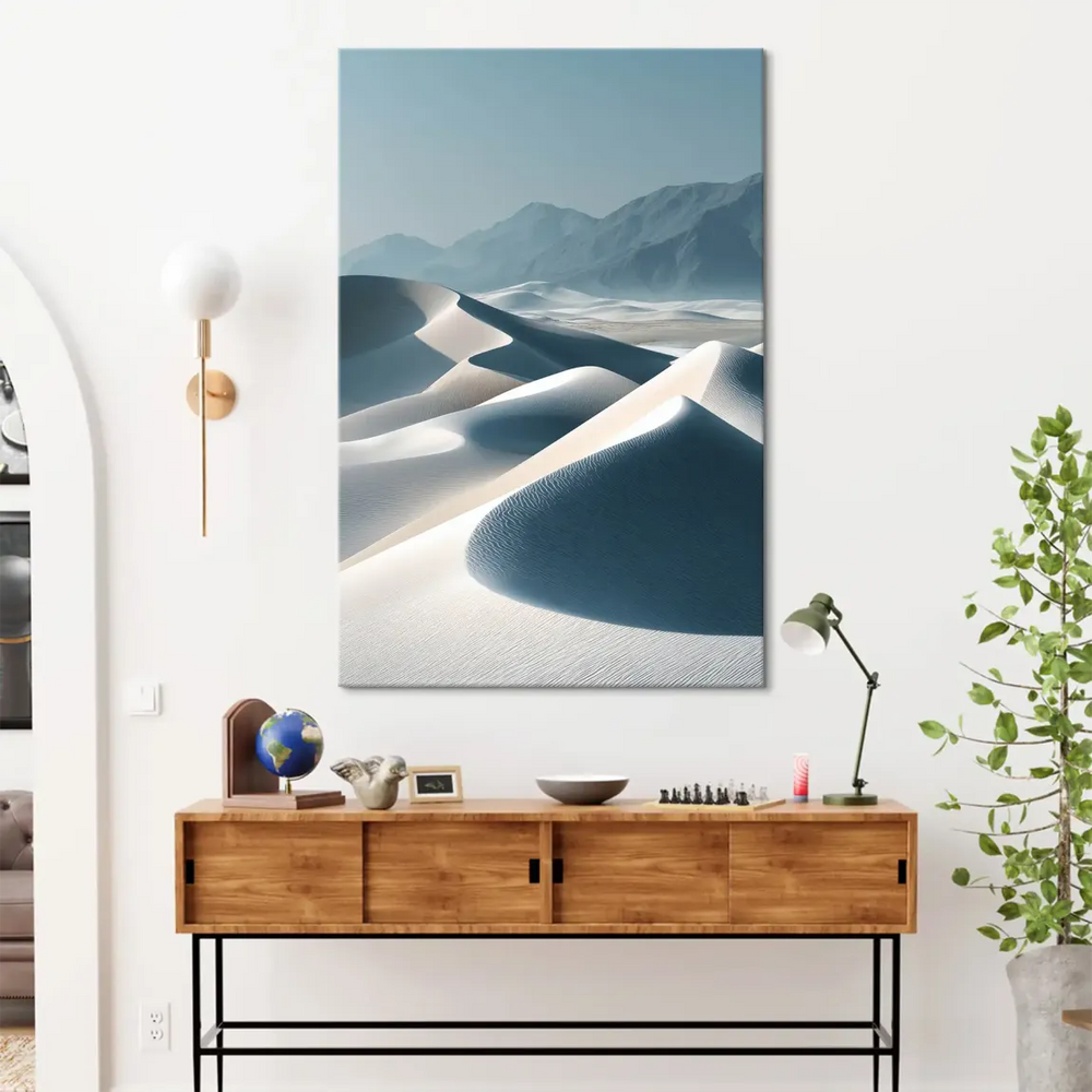Modern wall art featuring dune lines and distant mountains