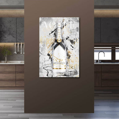 Fashion-forward wall art with Vogue lettering visible behind the bottle on a monochrome backdrop.