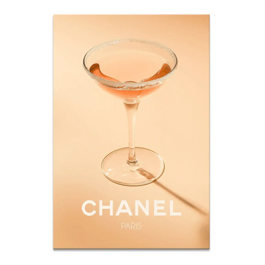 Chanel Glam Cocktail canvas print featuring a pink cocktail in a coupe glass on a peach background with white Chanel PARIS typography.