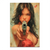 Close-up portrait of a young woman with long, dark wet hair holding a silver handgun in a gritty urban setting