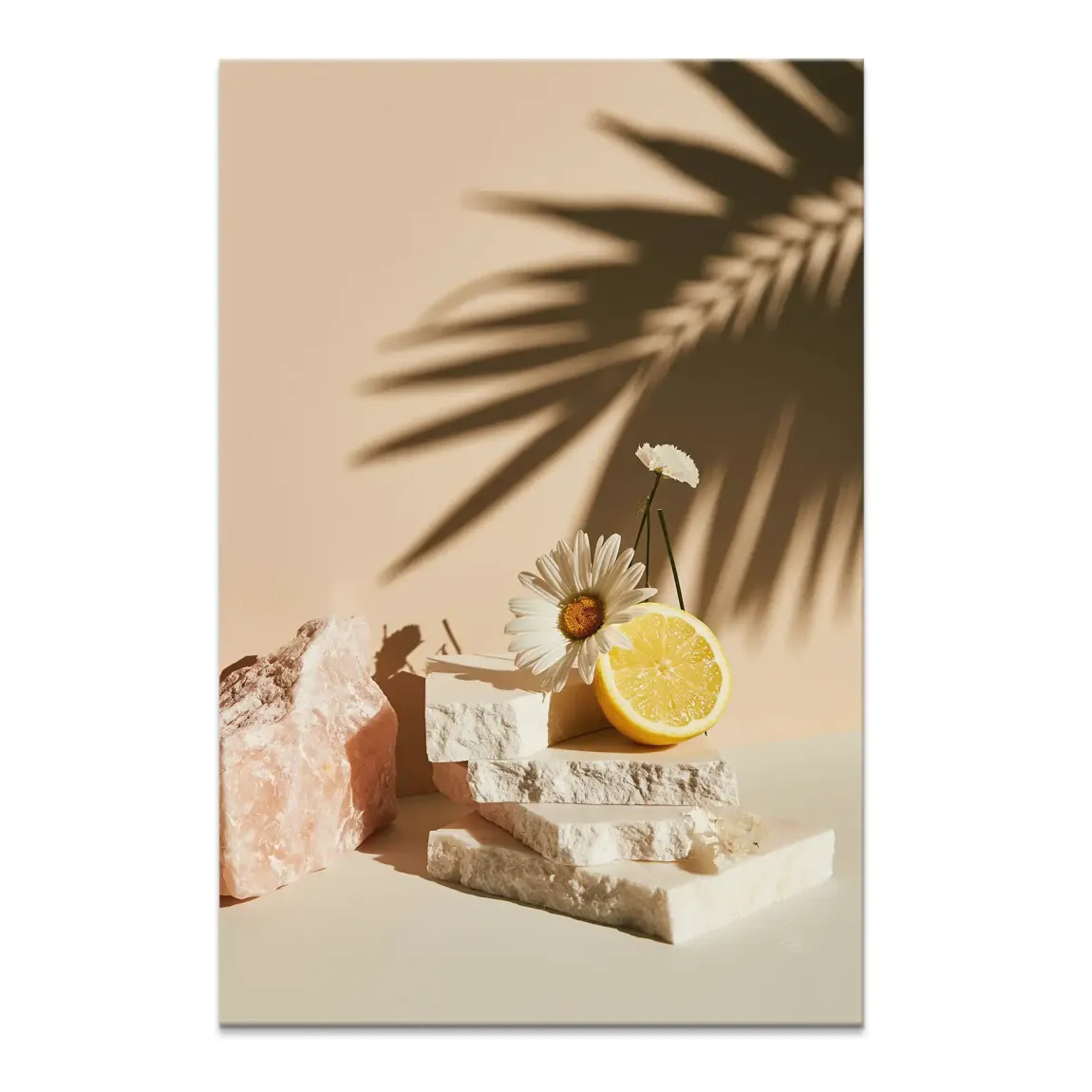 Citrus Blossom canvas wall art featuring a halved lemon, white daisies, and pale pink stone blocks on a warm beige surface with a palm leaf shadow