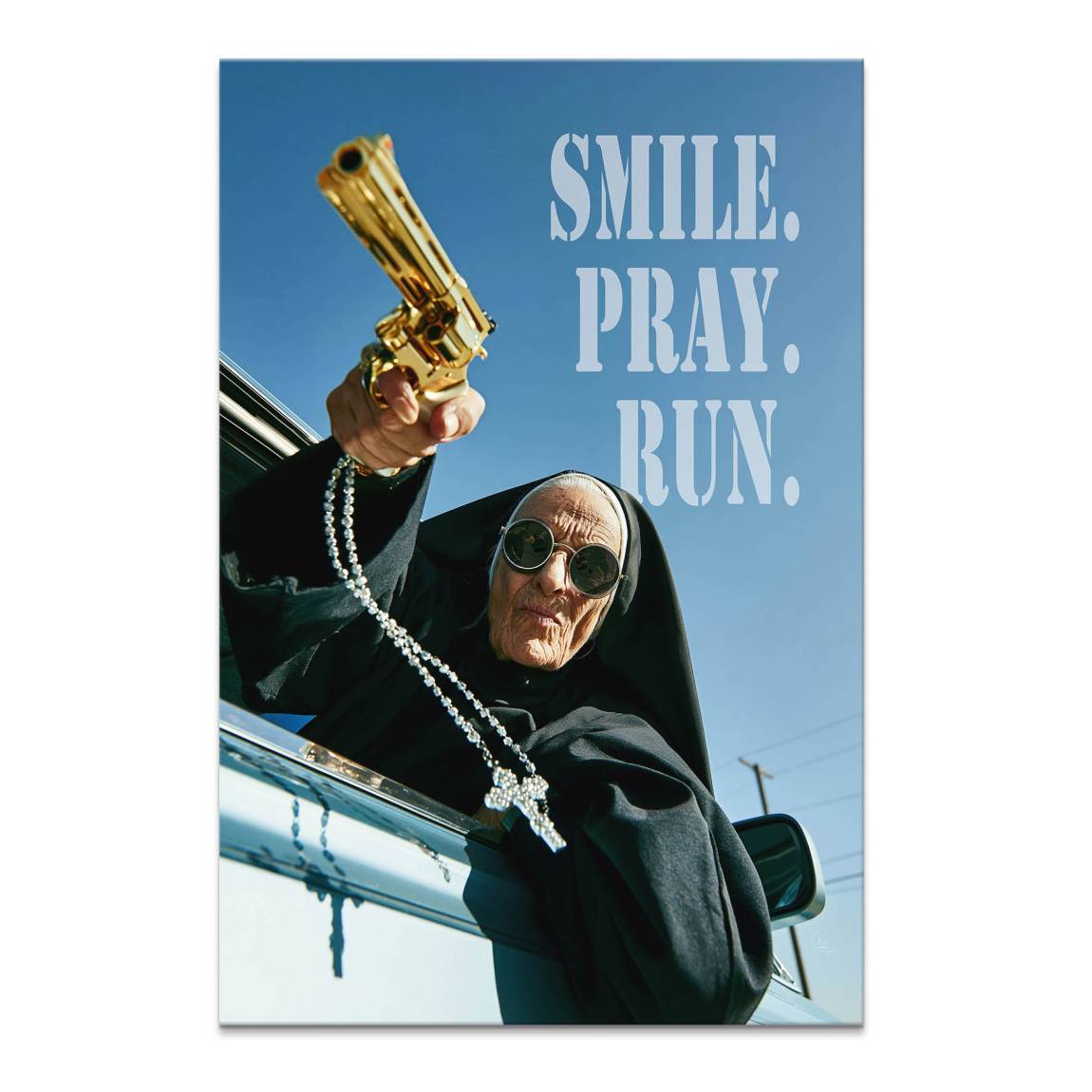 Rebel nun wearing round sunglasses leans from a car window holding a golden pistol and rosary in a bold Pop Art composition.