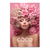 Glamorous portrait of a woman with blonde curly hair, adorned with large pink paper flowers against a soft pink background.