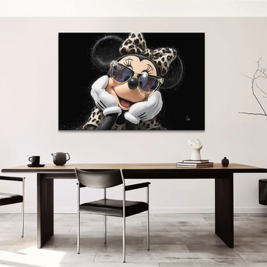 Leopard-print bow and top with glittering accents on a dark background