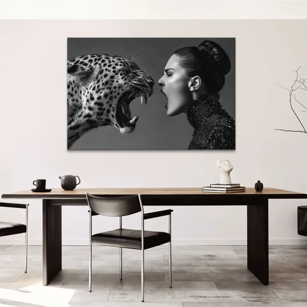 Close-up detail of the leopard's open mouth beside the woman's profile in high-contrast black and white.