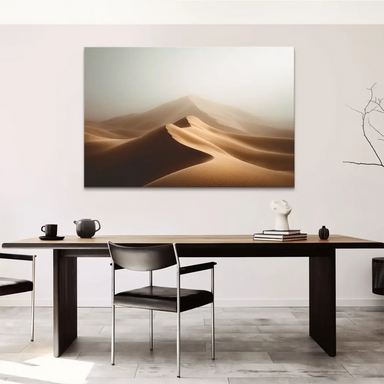 Foreground dunes with sharp ridges in ochre tones and soft fog in distance