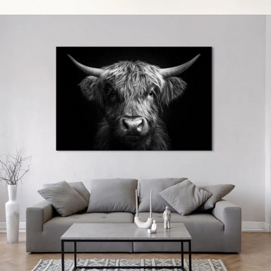 Detailed Highland cow canvas wall art with dark background and symmetrical composition