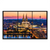 Cologne Cathedral and Rhine River at dusk with warm sunset tones over the city