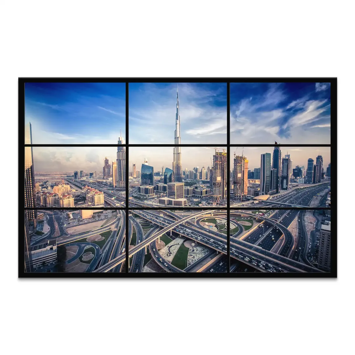 Aerial panoramic view of Dubai's skyline at dusk featuring Burj Khalifa among glassy skyscrapers and glowing highways.