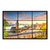 Hamburg sunset view canvas print featuring Landungsbrücken clock tower and harbor buildings bathed in golden light.
