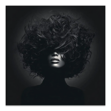 Monochrome portrait of a woman with curly hair obscuring her face on a canvas print.