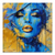 Close-up portrait of a woman in cobalt blue with gold eyelids and gold lips on a textured abstract canvas