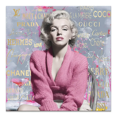 Iconic Marilyn Monroe Pop Art portrait on canvas with pink sweater and gold typography graffiti backdrop.