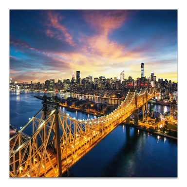 Aerial view of Manhattan at dusk with the Queensboro Bridge over the East River and a glowing skyline.