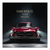 Front head-on view of a red Mercedes-Benz 300SL canvas wall art with gold The Best or Nothing motto on a dark background
