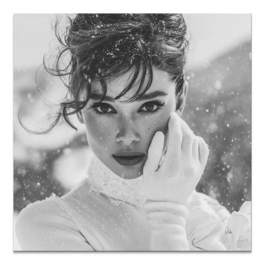 Black and white portrait of a glamorous woman in a snowy outdoor setting on canvas
