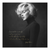 Square black-and-white Marilyn Monroe canvas portrait with a gold script quote in the lower left, wearing a turtleneck in a sophisticated wall art piece.