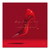 Glossy red high-heel shoe on a monochromatic red background with gold accents and an empowering gold quote.