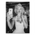 Black-and-white portrait of a glamorous woman taking a selfie with a smartphone, blending vintage Hollywood glamour with pop art energy.